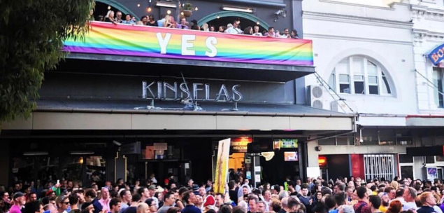 Kinselas venue surrounded by crowds at Mardi Gras