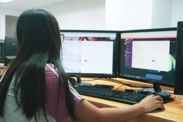 woman on desktop